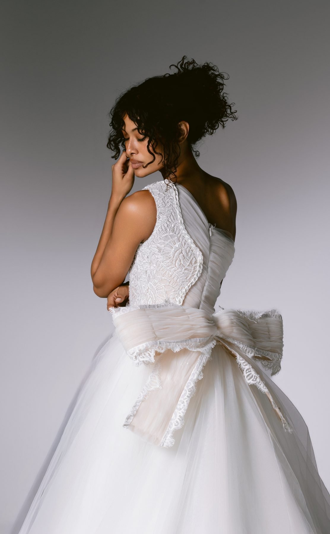 Back view of a gown with oversized bow